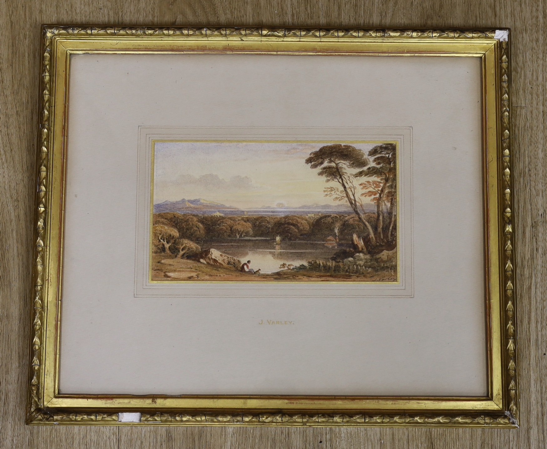 John Varley (1778-1842), watercolour, Landscape with figure seated beside a lake, signed, 12 x 21cm. Provenance: F R Meatyard, London